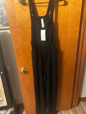 HALARA Black Relaxed Bib Jumpsuit with Button Straps